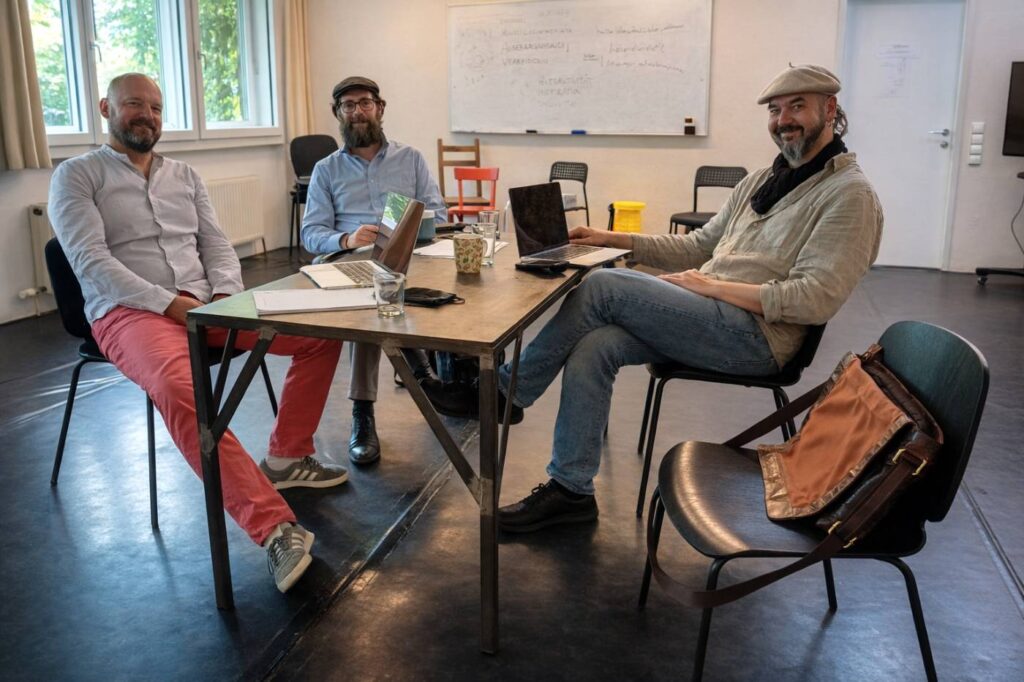 Marcus Josef Weiss | David Ketter | Martin Benkovics in einem Meeting